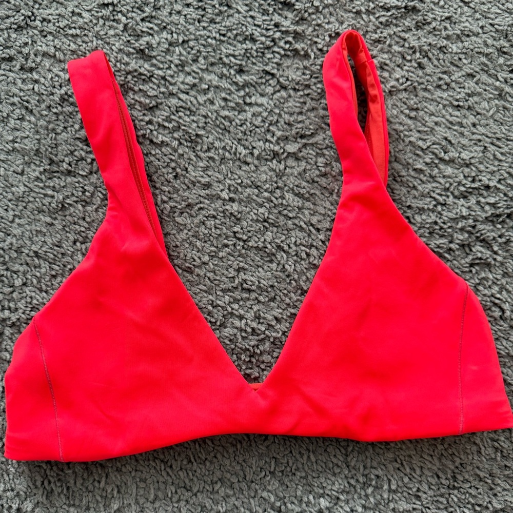 Left on Friday plunge top in rescue red! Size small